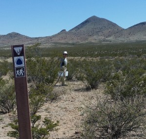 Porter walks into desert near Lordsburg to drop off 5 gals. water for cache